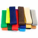 Folded bundles of 8cm crinoline horsehair braid in assorted colours for millinery