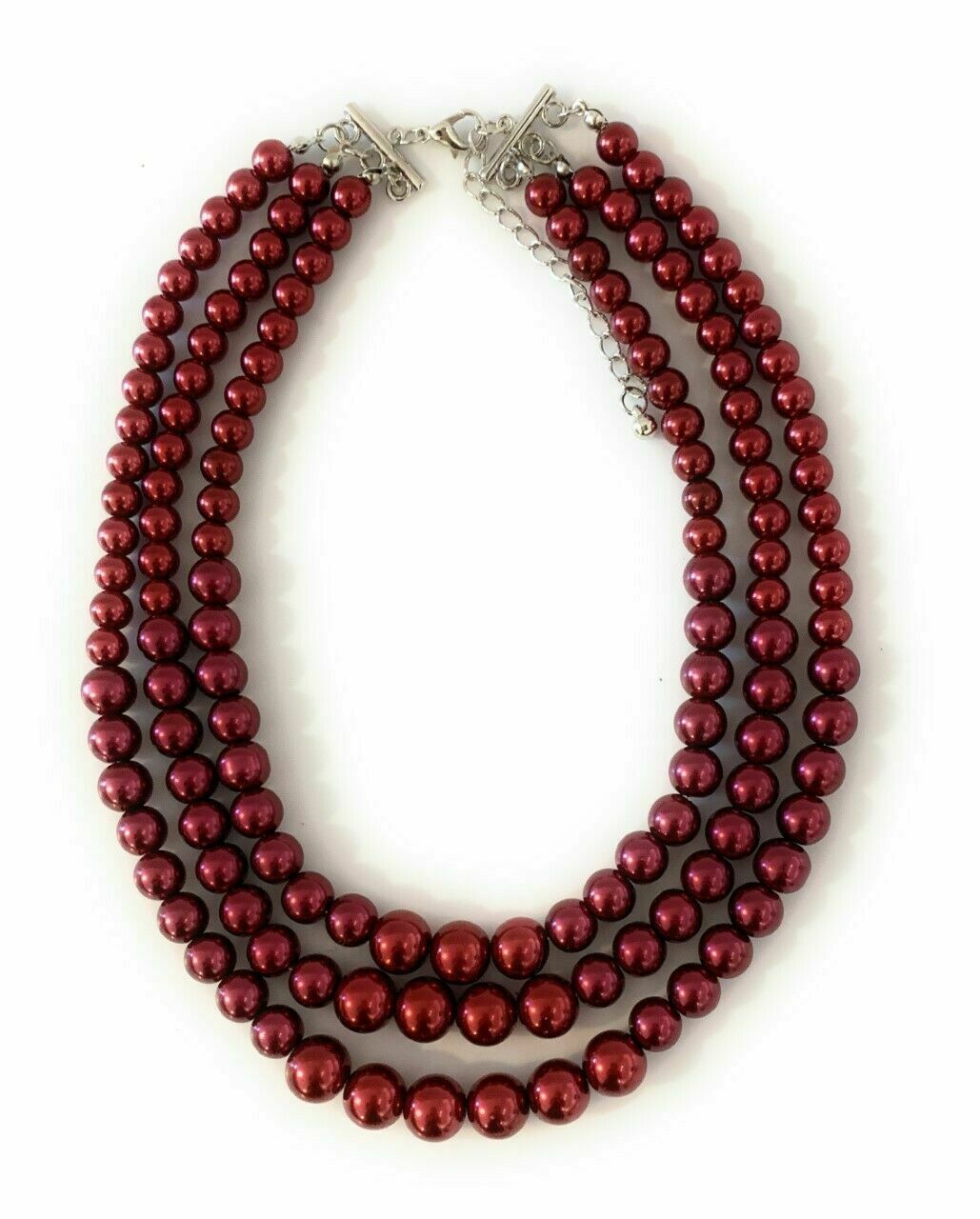 Ensemble collier et boucles d'oreilles en fausses perles bordeaux