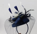 Navy and Ivory Pillbox Fascinator with birdcage veil and flower feathers