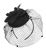 black pillbox fascinator with a bow, feathers and a birdcage veil 