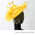 saucer fascinator with birdcage veil, decorative loops and feathers, shown on a mannequin